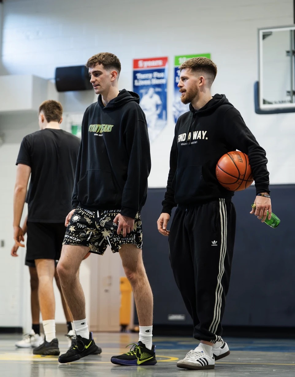 Zoran and Coleman on court at their basketball academy